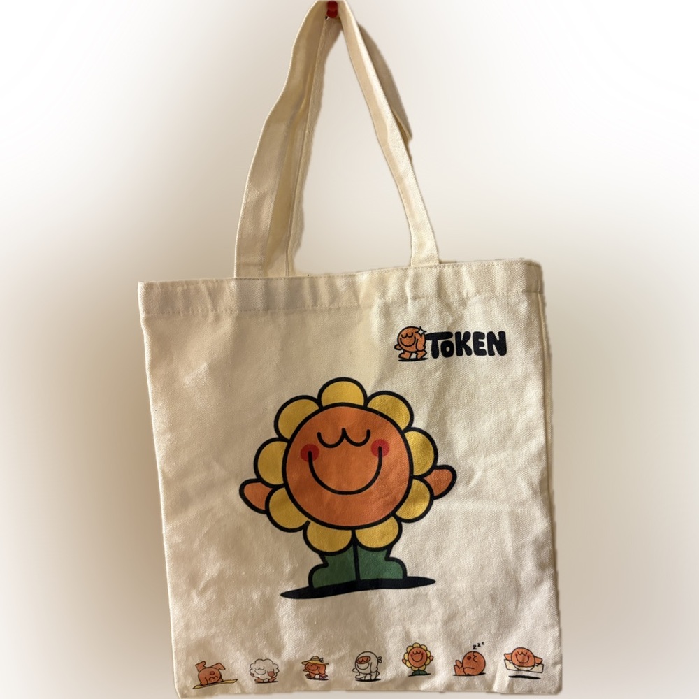 Token Canvas Tote Bag with Smiling Flower Design